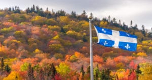 Quebec flag and mountains in the background
