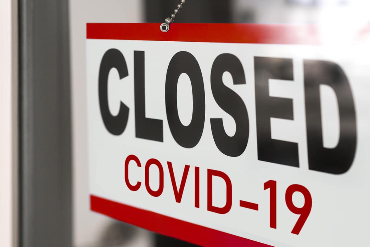 "Closed COVID-19" sign