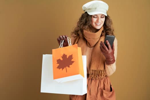 Woman holding Canadian shopping bag