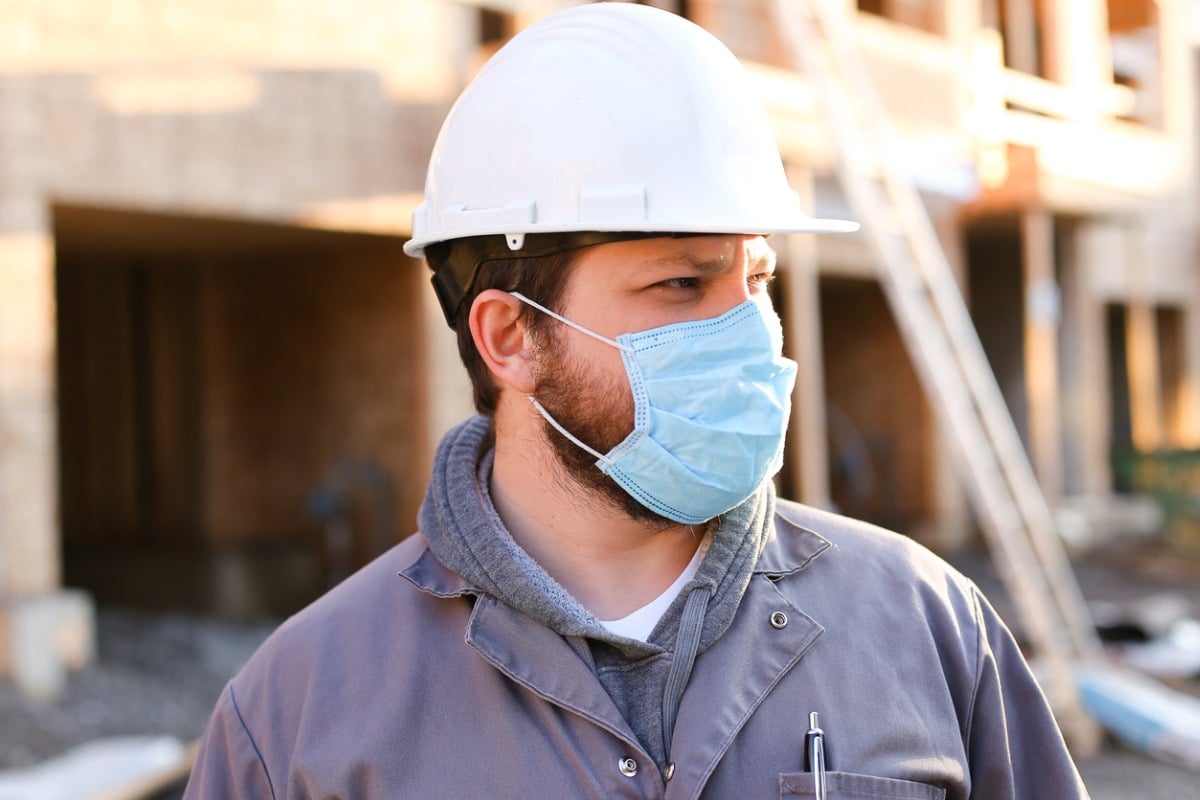 Worker wearing surgical mask