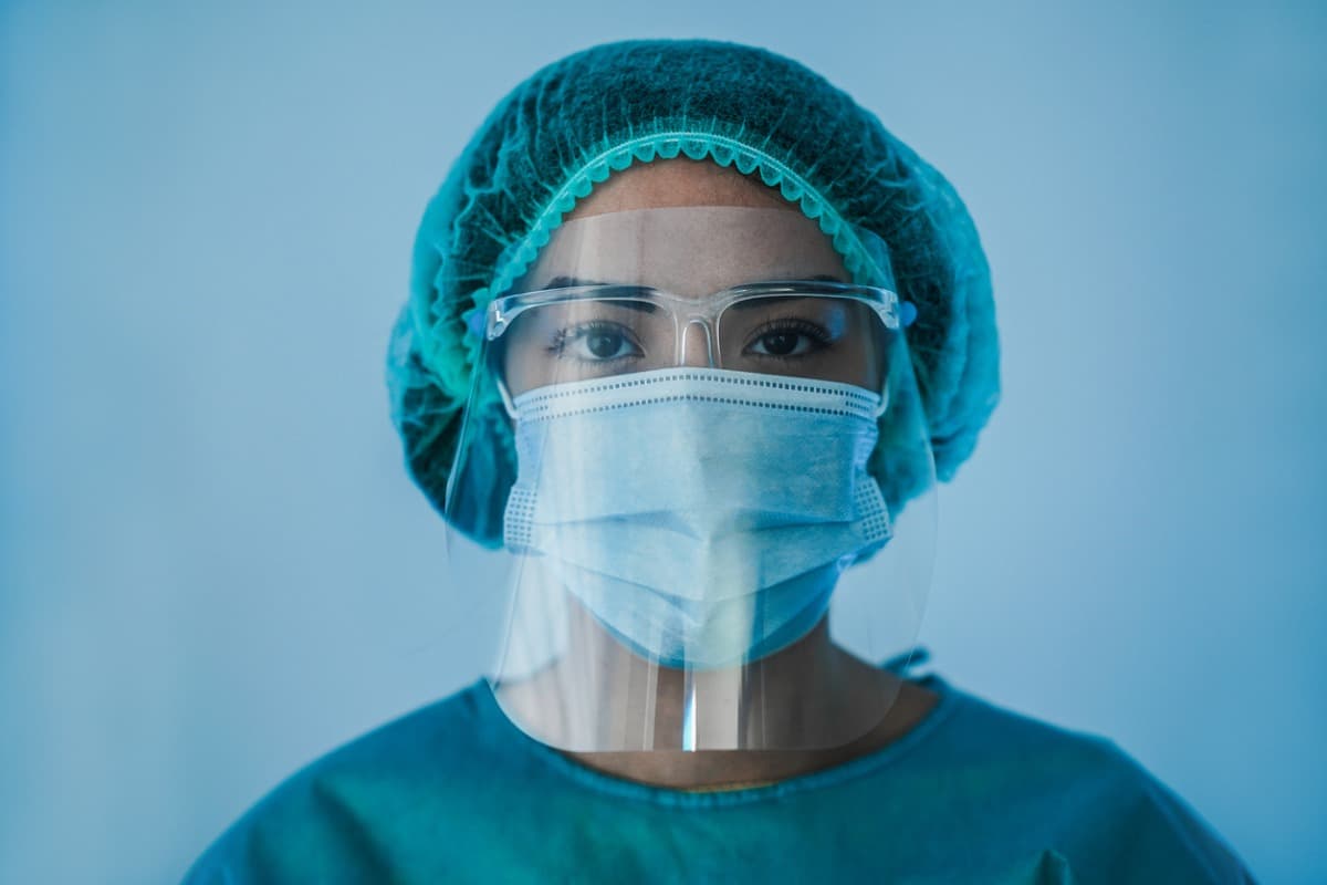 Nurse wearing COVID-19 safety equipment