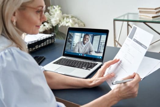 Canadian employer conducting a virtual interview with a job candidate