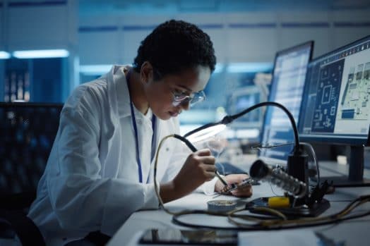 Scientist working in a computer lab.