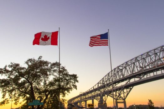 Canadian and American flags