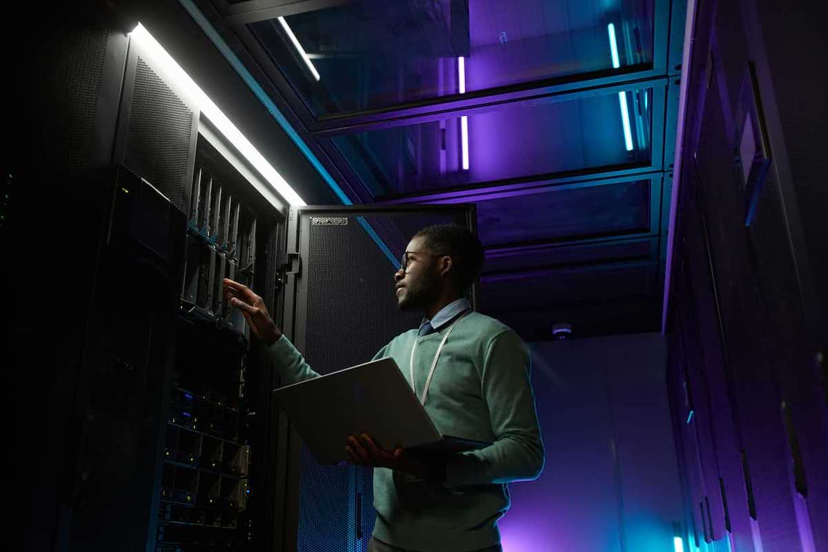A man in a server room. Canada has added 5 new occupations to the eligible list of the Global Talent Stream.
