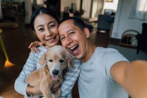 Happy family with a puppy