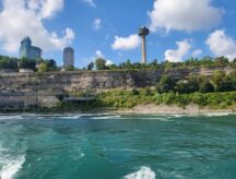 View of Skylon Tower and abandond Ontario Power Comany Generating Station at river level seeing from a boat tour