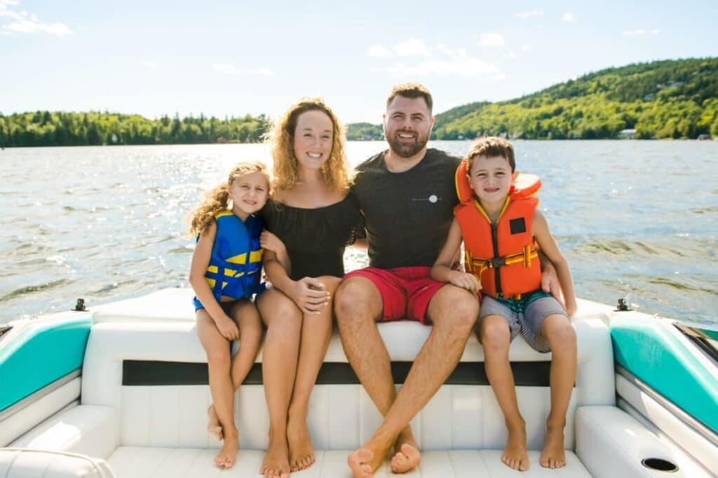 A Family out boating together having fun on vacation
