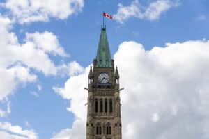 Parliament building with Canadian flag in Ottawa