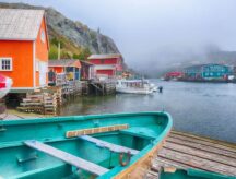 Colourful fishing village of Quidi Vidi in St John's, Newfoundland on a foggy, overcast day.