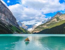 A couple in a canoe on Lake Louise in Banff