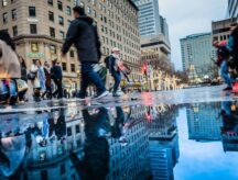 People walking on a busy street in Canada