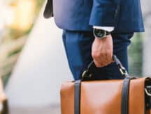 Business man carrying briefcase