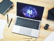 A laptop with AI on it.