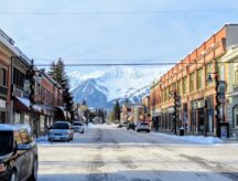 A view down the streets of downtown Fernie, British Columbia (a popular ski town in the Rockies) on a sunny morning during the winter.