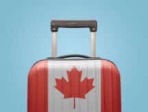 Suitcase with Canadian flag design travel America concept.
