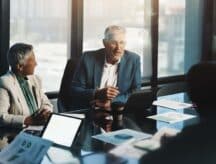 A group of business people at work.