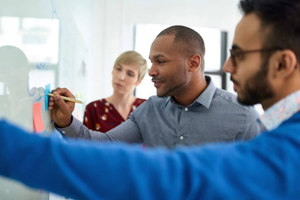A group of workers in an office in Canada.