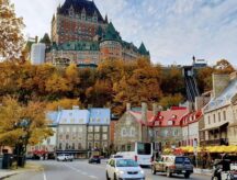 Le Chateau Frontenac Hotel sits above the old town of Quebec City during fall.