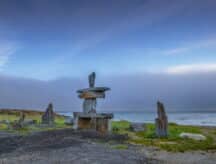A lone totem sits on the Manitoba coast.