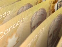 A close-up of Canadian $100 bills.