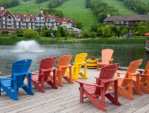 A set of chairs set out at a lake in Blue Mountain Ontario.