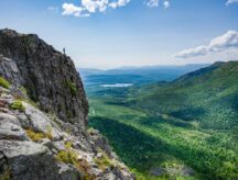 A man hiking in the hills of Quebec.