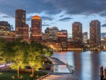 The Boston, Massachusetts, downtown harbour and city skyline at twilight.