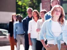 People wait in line.