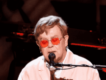 A photo of Elton Joh preforming in 2024.