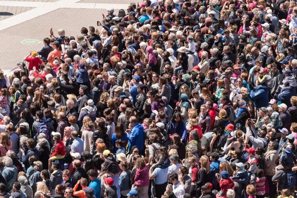 A crowd gathers at Place des Arts in Montreal