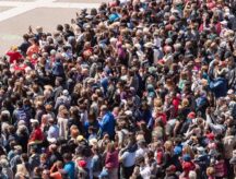 A crowd gathers at Place des Arts in Montreal