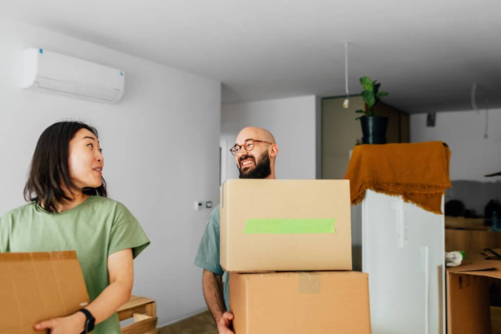 couple moving into new rental apartment
