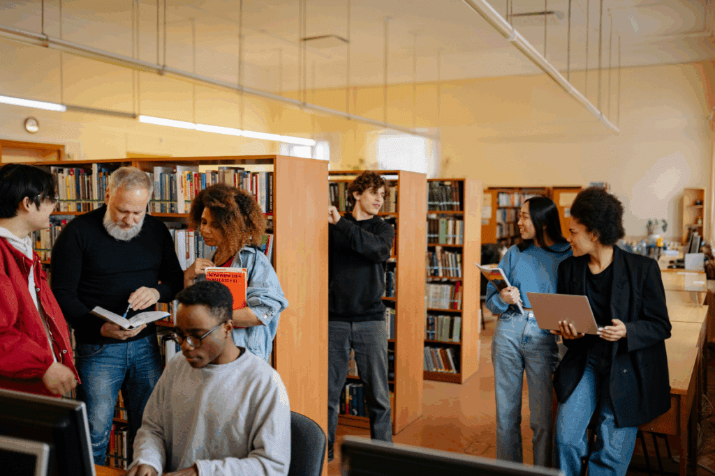 people reading books in the library