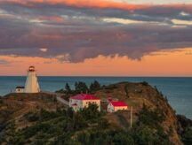 The Sallowtail Lighthouse overlooking the Bay of Fundy at sunset.