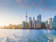 A view of the Toronto skyline on a summer sunrise.