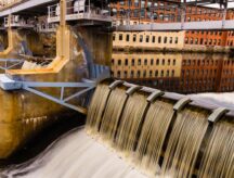 A running mill in the town of Woonsocket Rhode Island, which contributed to much of the immigration from French Canada to the city.