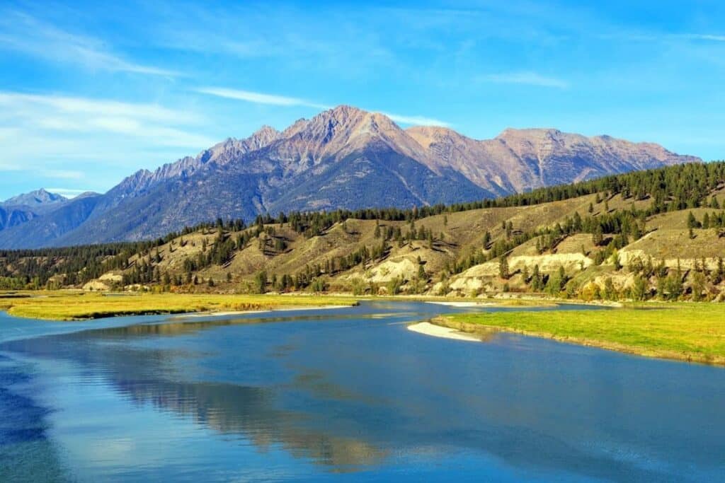 Landscape view of The Steeples in the Canadian Rockies with the Bull River in the East Kootenay near Cranbrook, British Columbia, Canada.
