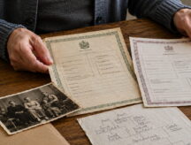 A lady looks through her gathered documents in anticipation of submitting a citizenship by descent application