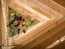 A construction worker building a house.