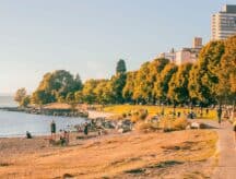 A shot of a beach in Vancouver, with people enjoying the day.