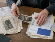 A citizenship by descent applicant goes through their documents that they will attach in support of their application.