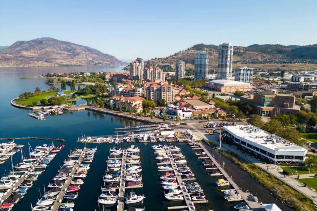 Drone aerial view of the marina yacht club and waterfront of the city of Kelowna, British Columbia, Canada, located in the Okanagan Valley.