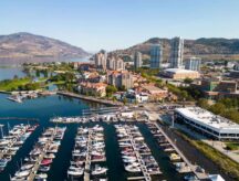 Drone aerial view of the marina yacht club and waterfront of the city of Kelowna, British Columbia, Canada, located in the Okanagan Valley.