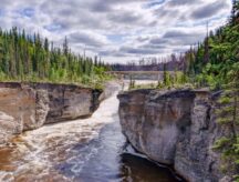 View to Sambaa Deh Falls on Trout River. Northwest Territories, Canada.
