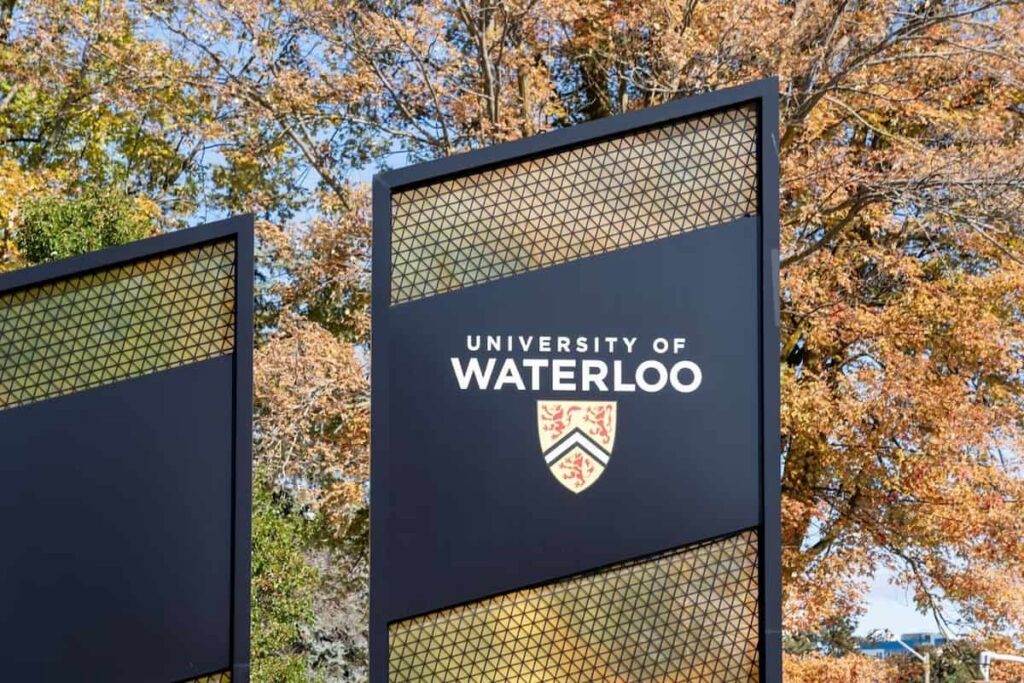University of Waterloo (UW) sign seen at the main campus entrance in Waterloo, ON, Canada
