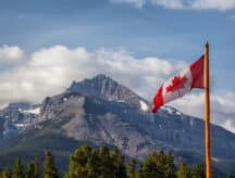 The Canadian flag with Rockie Mountains in the background, taken in Banff National Park, Alberta, Canada.